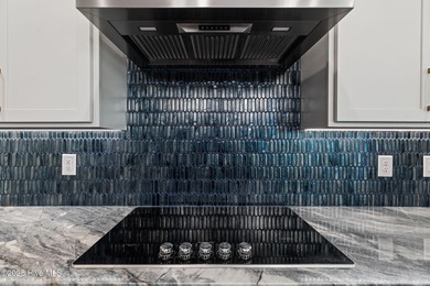 Stunning new construction in the desirable and gated community on Carolina National Golf Club in North Carolina - for sale on GolfHomes.com, golf home, golf lot