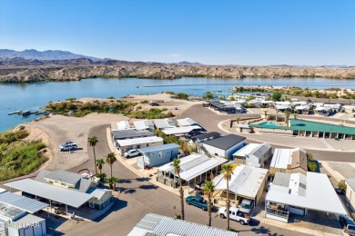 On leased land - Lakeview Escape - Fully Furnished, Steps from on London Bridge Golf Course in Arizona - for sale on GolfHomes.com, golf home, golf lot