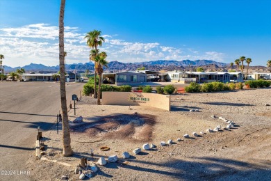 On leased land - Lakeview Escape - Fully Furnished, Steps from on London Bridge Golf Course in Arizona - for sale on GolfHomes.com, golf home, golf lot