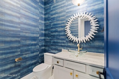 Stunning new construction in the desirable and gated community on Carolina National Golf Club in North Carolina - for sale on GolfHomes.com, golf home, golf lot