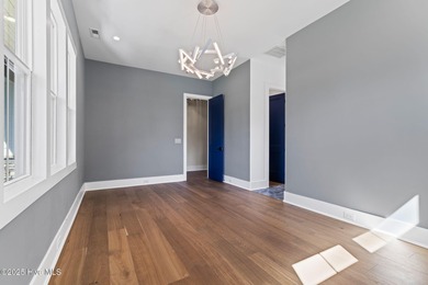 Stunning new construction in the desirable and gated community on Carolina National Golf Club in North Carolina - for sale on GolfHomes.com, golf home, golf lot