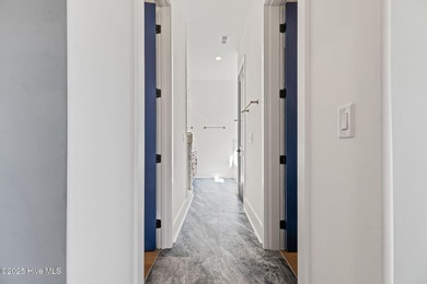 Stunning new construction in the desirable and gated community on Carolina National Golf Club in North Carolina - for sale on GolfHomes.com, golf home, golf lot