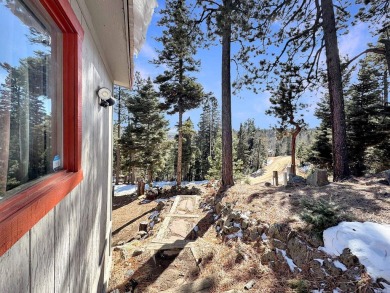 If you are looking for a mountain getaway, this charming on Angel Fire Resort Country Club in New Mexico - for sale on GolfHomes.com, golf home, golf lot