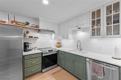 Bright, spacious townhouse in the San Carlos Park area with on Estero Country Club in Florida - for sale on GolfHomes.com, golf home, golf lot