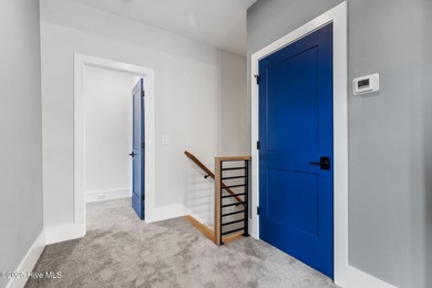 Stunning new construction in the desirable and gated community on Carolina National Golf Club in North Carolina - for sale on GolfHomes.com, golf home, golf lot