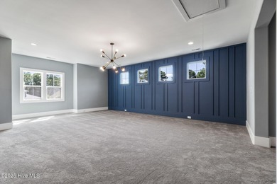 Stunning new construction in the desirable and gated community on Carolina National Golf Club in North Carolina - for sale on GolfHomes.com, golf home, golf lot