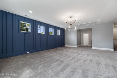 Stunning new construction in the desirable and gated community on Carolina National Golf Club in North Carolina - for sale on GolfHomes.com, golf home, golf lot