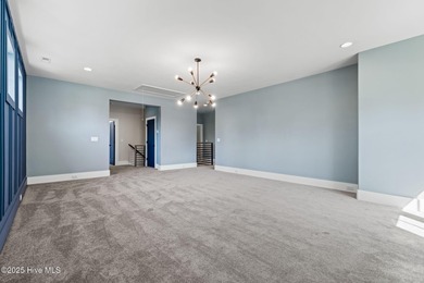 Stunning new construction in the desirable and gated community on Carolina National Golf Club in North Carolina - for sale on GolfHomes.com, golf home, golf lot