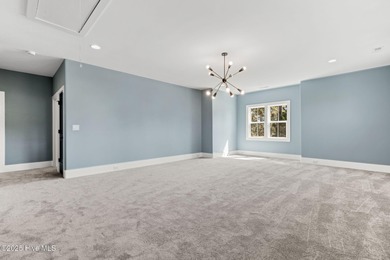 Stunning new construction in the desirable and gated community on Carolina National Golf Club in North Carolina - for sale on GolfHomes.com, golf home, golf lot