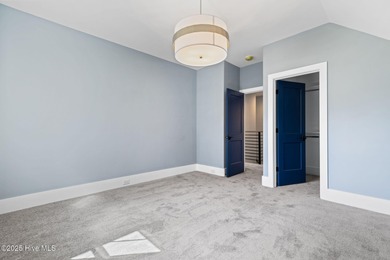 Stunning new construction in the desirable and gated community on Carolina National Golf Club in North Carolina - for sale on GolfHomes.com, golf home, golf lot