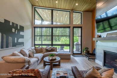 Nestled against the Bridger-Teton National Forest, 15415 Tall on Snake River Sporting Club in Wyoming - for sale on GolfHomes.com, golf home, golf lot