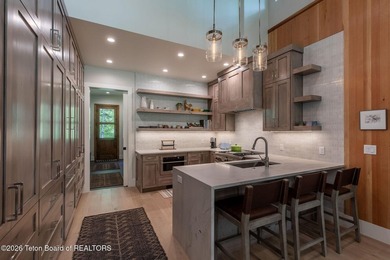 Nestled against the Bridger-Teton National Forest, 15415 Tall on Snake River Sporting Club in Wyoming - for sale on GolfHomes.com, golf home, golf lot