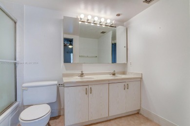Great unit on top floor, views of garden and pool from your on Wynmoor Golf Course in Florida - for sale on GolfHomes.com, golf home, golf lot