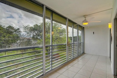 Great unit on top floor, views of garden and pool from your on Wynmoor Golf Course in Florida - for sale on GolfHomes.com, golf home, golf lot