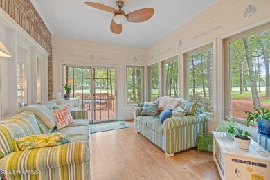 This beautiful home, across from a pretty pond, is located along on Lockwood Folly Country Club in North Carolina - for sale on GolfHomes.com, golf home, golf lot