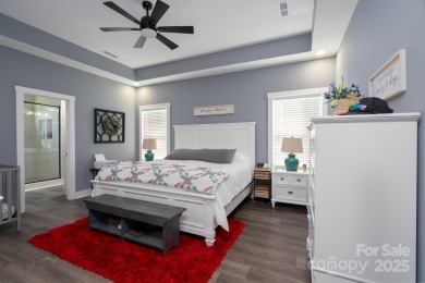 Fabulous golf course home featuring impressive vaulted ceiling on Woodbridge Golf Links in North Carolina - for sale on GolfHomes.com, golf home, golf lot