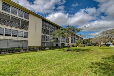 Great unit on top floor, views of garden and pool from your on Wynmoor Golf Course in Florida - for sale on GolfHomes.com, golf home, golf lot