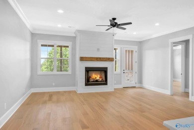 Located in Gunter's Landing Golf Club, this lake view villa on Gunters Landing in Alabama - for sale on GolfHomes.com, golf home, golf lot
