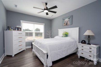 Fabulous golf course home featuring impressive vaulted ceiling on Woodbridge Golf Links in North Carolina - for sale on GolfHomes.com, golf home, golf lot