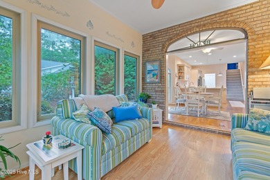 This beautiful home, across from a pretty pond, is located along on Lockwood Folly Country Club in North Carolina - for sale on GolfHomes.com, golf home, golf lot