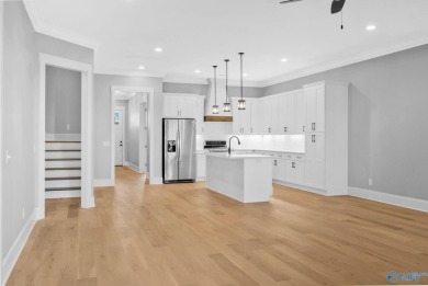 Located in Gunter's Landing Golf Club, this lake view villa on Gunters Landing in Alabama - for sale on GolfHomes.com, golf home, golf lot