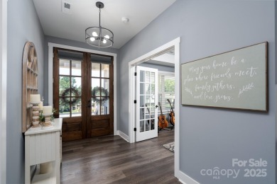 Fabulous golf course home featuring impressive vaulted ceiling on Woodbridge Golf Links in North Carolina - for sale on GolfHomes.com, golf home, golf lot