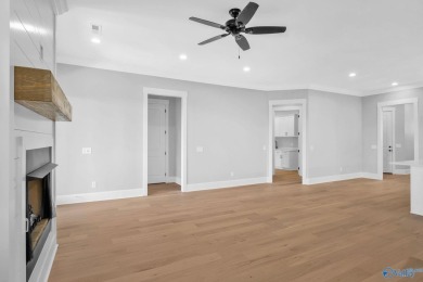 Located in Gunter's Landing Golf Club, this lake view villa on Gunters Landing in Alabama - for sale on GolfHomes.com, golf home, golf lot