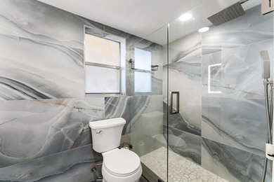 Welcome to easy living in this beautifully updated home located on Poinciana Golf Club in Florida - for sale on GolfHomes.com, golf home, golf lot