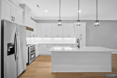 Located in Gunter's Landing Golf Club, this lake view villa on Gunters Landing in Alabama - for sale on GolfHomes.com, golf home, golf lot
