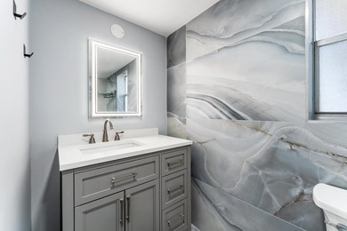 Welcome to easy living in this beautifully updated home located on Poinciana Golf Club in Florida - for sale on GolfHomes.com, golf home, golf lot