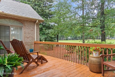 This beautiful home, across from a pretty pond, is located along on Lockwood Folly Country Club in North Carolina - for sale on GolfHomes.com, golf home, golf lot