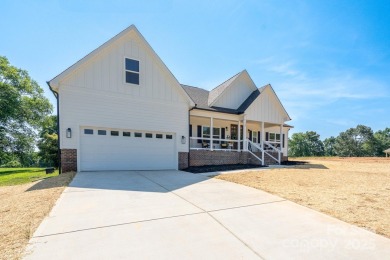 Fabulous golf course home featuring impressive vaulted ceiling on Woodbridge Golf Links in North Carolina - for sale on GolfHomes.com, golf home, golf lot