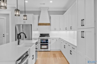 Located in Gunter's Landing Golf Club, this lake view villa on Gunters Landing in Alabama - for sale on GolfHomes.com, golf home, golf lot