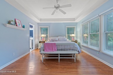 This beautiful home, across from a pretty pond, is located along on Lockwood Folly Country Club in North Carolina - for sale on GolfHomes.com, golf home, golf lot