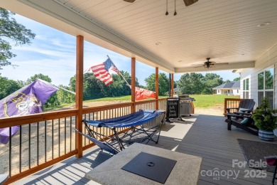 Fabulous golf course home featuring impressive vaulted ceiling on Woodbridge Golf Links in North Carolina - for sale on GolfHomes.com, golf home, golf lot