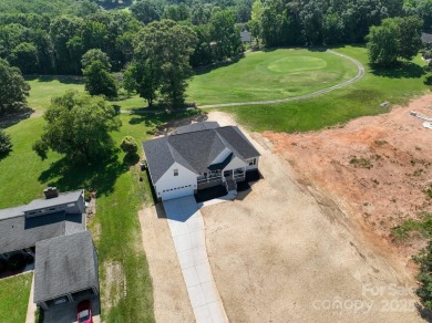 Fabulous golf course home featuring impressive vaulted ceiling on Woodbridge Golf Links in North Carolina - for sale on GolfHomes.com, golf home, golf lot