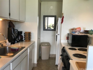 Monte Vista is a high rise building reminiscent of Old Hawaiiana on Ala Wai Golf Course in Hawaii - for sale on GolfHomes.com, golf home, golf lot