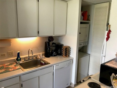 Monte Vista is a high rise building reminiscent of Old Hawaiiana on Ala Wai Golf Course in Hawaii - for sale on GolfHomes.com, golf home, golf lot