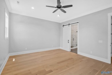 Located in Gunter's Landing Golf Club, this lake view villa on Gunters Landing in Alabama - for sale on GolfHomes.com, golf home, golf lot