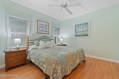 This beautiful home, across from a pretty pond, is located along on Lockwood Folly Country Club in North Carolina - for sale on GolfHomes.com, golf home, golf lot