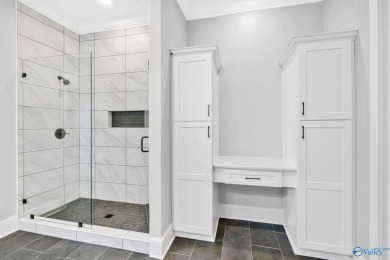 Located in Gunter's Landing Golf Club, this lake view villa on Gunters Landing in Alabama - for sale on GolfHomes.com, golf home, golf lot