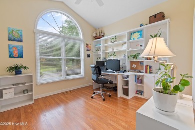 This beautiful home, across from a pretty pond, is located along on Lockwood Folly Country Club in North Carolina - for sale on GolfHomes.com, golf home, golf lot