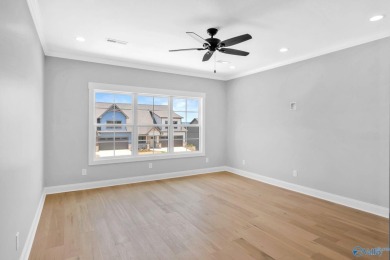 Located in Gunter's Landing Golf Club, this lake view villa on Gunters Landing in Alabama - for sale on GolfHomes.com, golf home, golf lot
