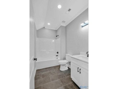 Located in Gunter's Landing Golf Club, this lake view villa on Gunters Landing in Alabama - for sale on GolfHomes.com, golf home, golf lot