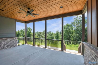Located in Gunter's Landing Golf Club, this lake view villa on Gunters Landing in Alabama - for sale on GolfHomes.com, golf home, golf lot