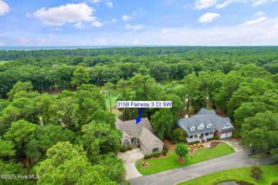 This beautiful home, across from a pretty pond, is located along on Lockwood Folly Country Club in North Carolina - for sale on GolfHomes.com, golf home, golf lot