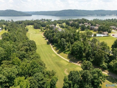 Located in Gunter's Landing Golf Club, this lake view villa on Gunters Landing in Alabama - for sale on GolfHomes.com, golf home, golf lot