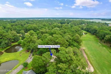 This beautiful home, across from a pretty pond, is located along on Lockwood Folly Country Club in North Carolina - for sale on GolfHomes.com, golf home, golf lot