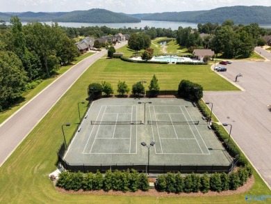 Located in Gunter's Landing Golf Club, this lake view villa on Gunters Landing in Alabama - for sale on GolfHomes.com, golf home, golf lot