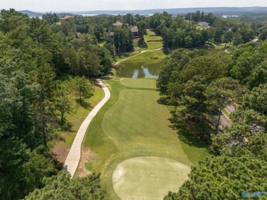 Located in Gunter's Landing Golf Club, this lake view villa on Gunters Landing in Alabama - for sale on GolfHomes.com, golf home, golf lot